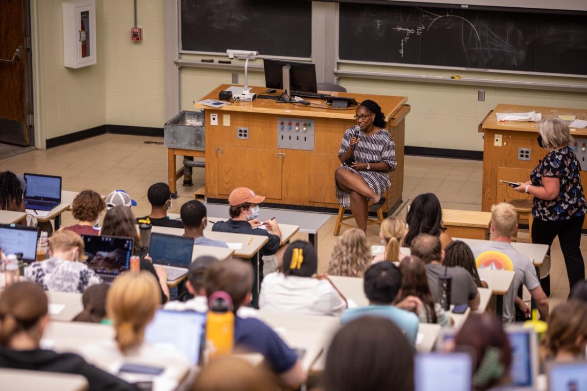 A picture of students listening to a professor teach